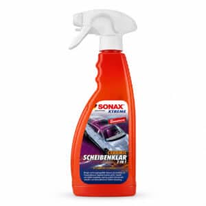 Sonax Scheibenklar 2in1 Sprühflasche Frontansicht Sonax Scheibenklar 2in1 Anwendung auf Autoscheibe Sonax Scheibenklar 2in1 Anti-Fog Effekt Innenscheibe